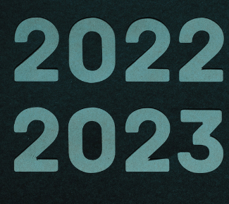 Black background with the years 2022 and 2023