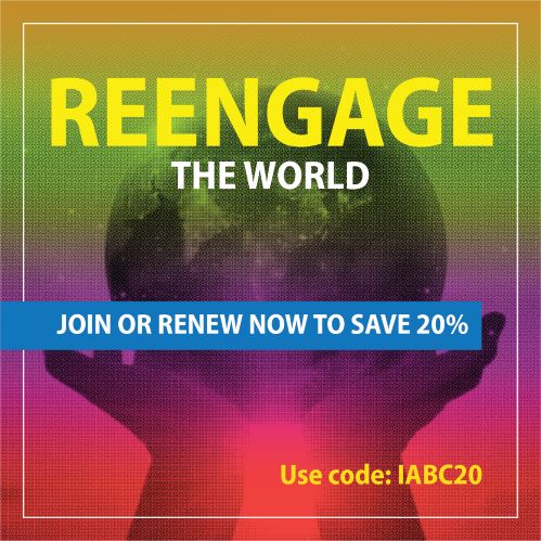 Multicolored background with 2 hands holding up the world. The words, "Reengage the World. Join or renew now to save 20%.  Use IABC20.